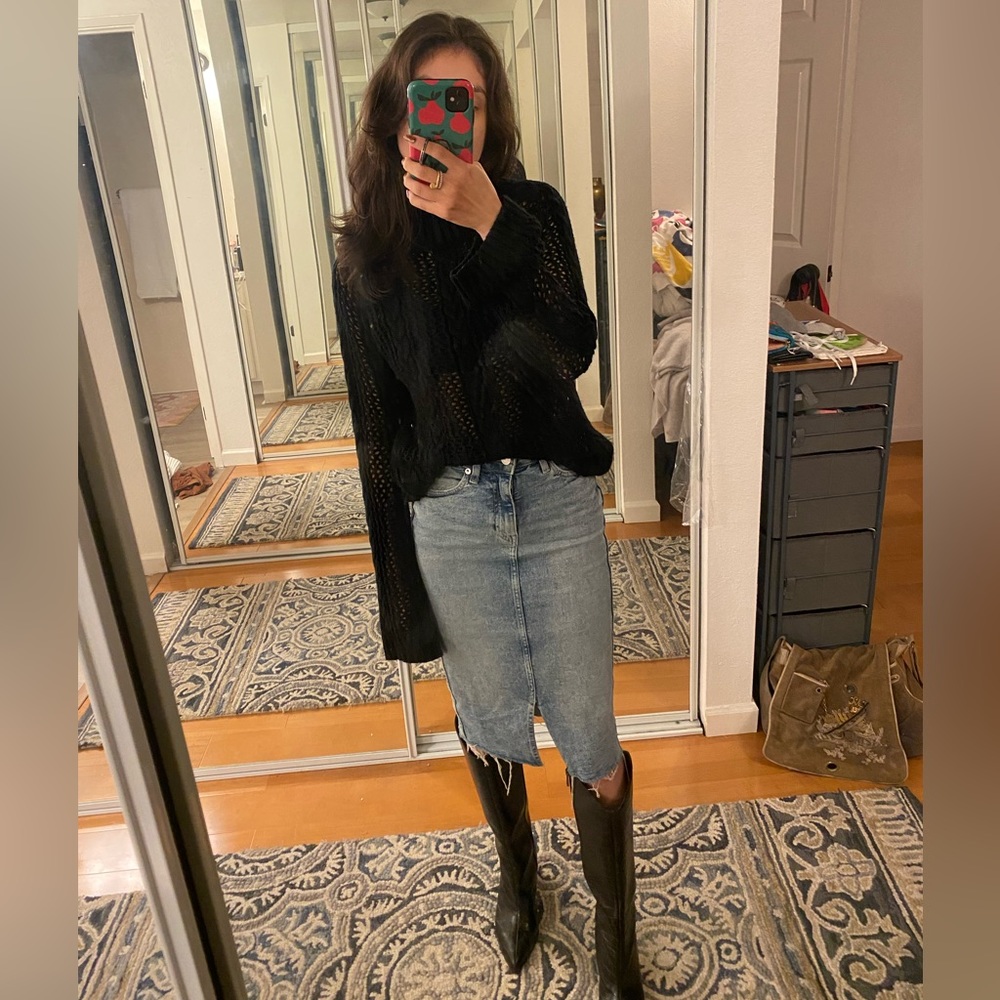 Small, black turtleneck